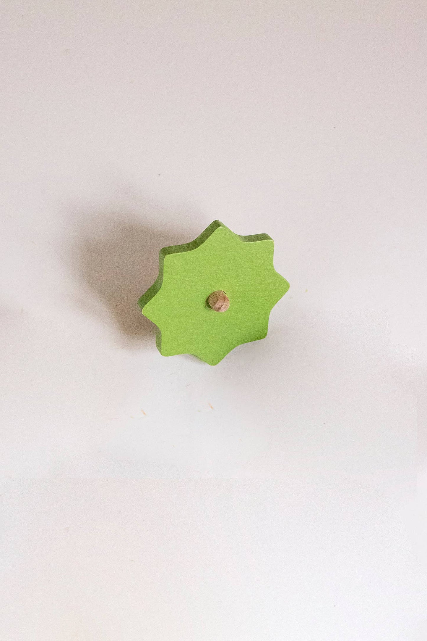Wooden Spinning top. Elements. Stormy