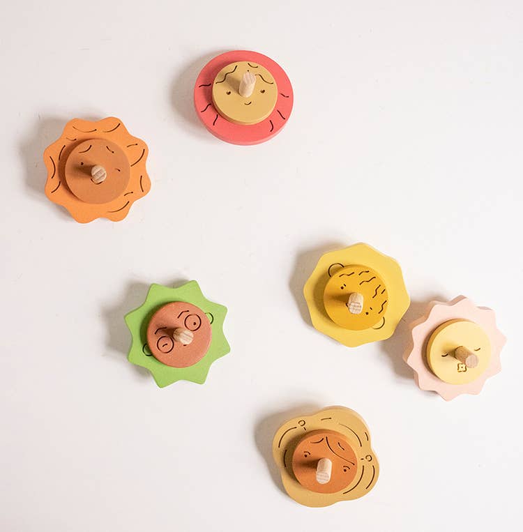 Wooden Spinning top. Elements. Stormy