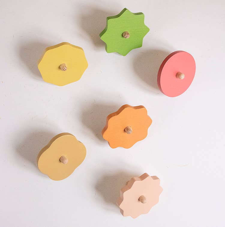 Wooden Spinning top. Elements. Stormy