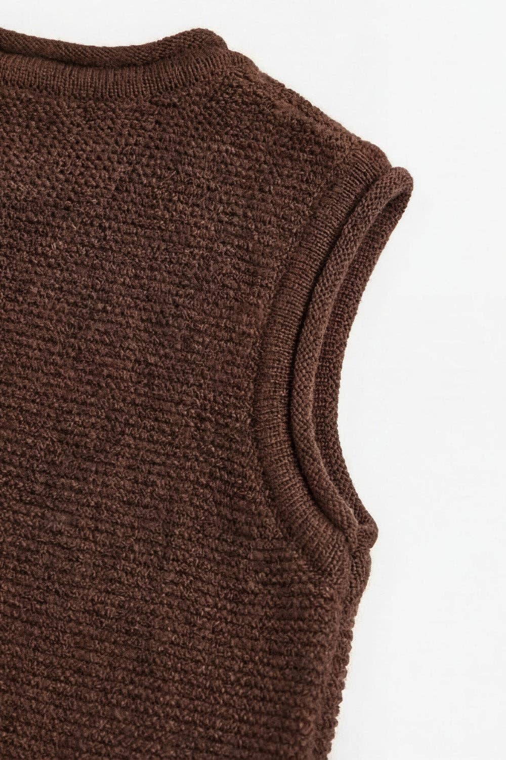 MERINO WOOL KNITTED BABY VEST
- CAROB: 50/56