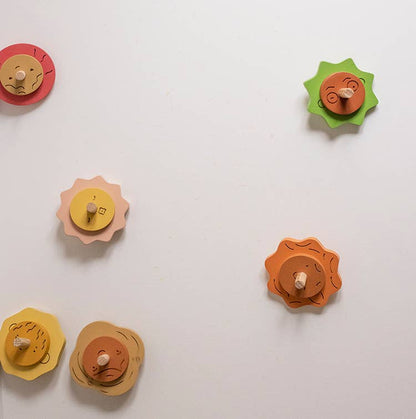 Wooden Spinning top. Elements. Stormy