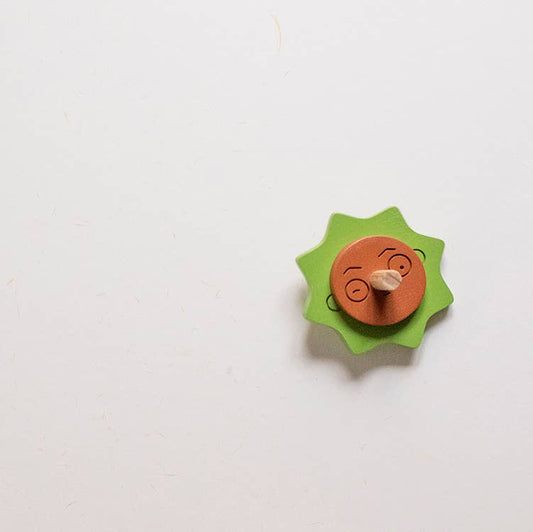 Wooden Spinning top. Elements. Stormy