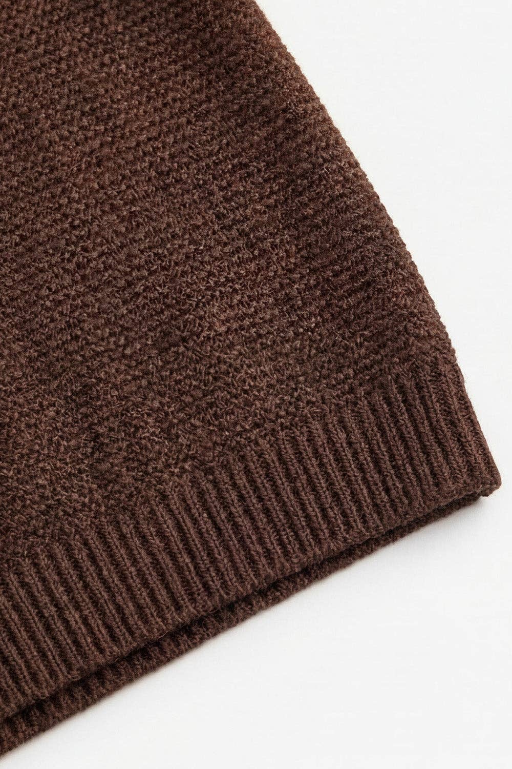 MERINO WOOL KNITTED BABY VEST
- CAROB: 50/56