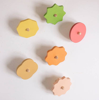 Wooden Spinning top. Elements. Stormy